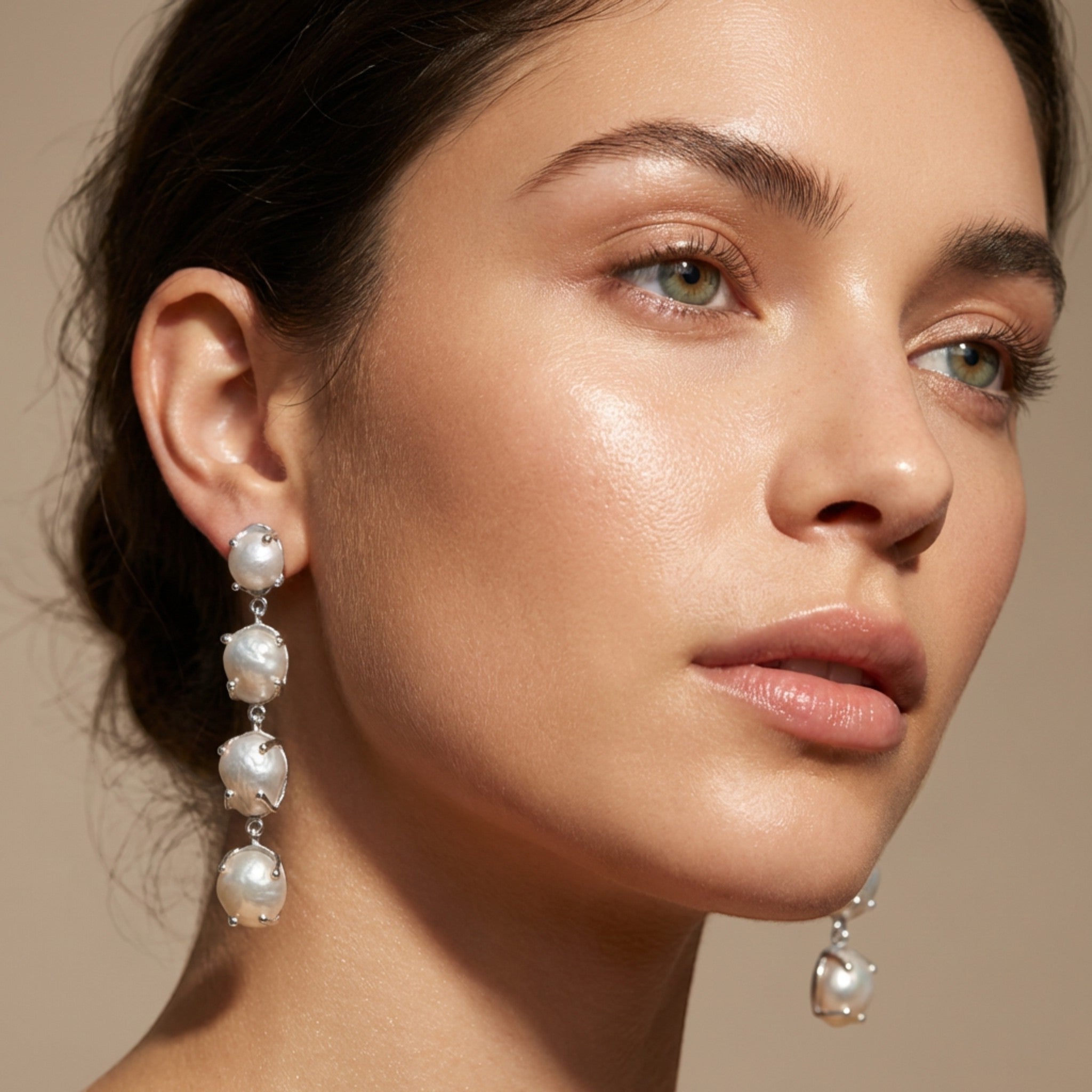 Tania Claire Australia Marnie baroque pearl drop earrings with silver-tone bezels, cascading elegantly.