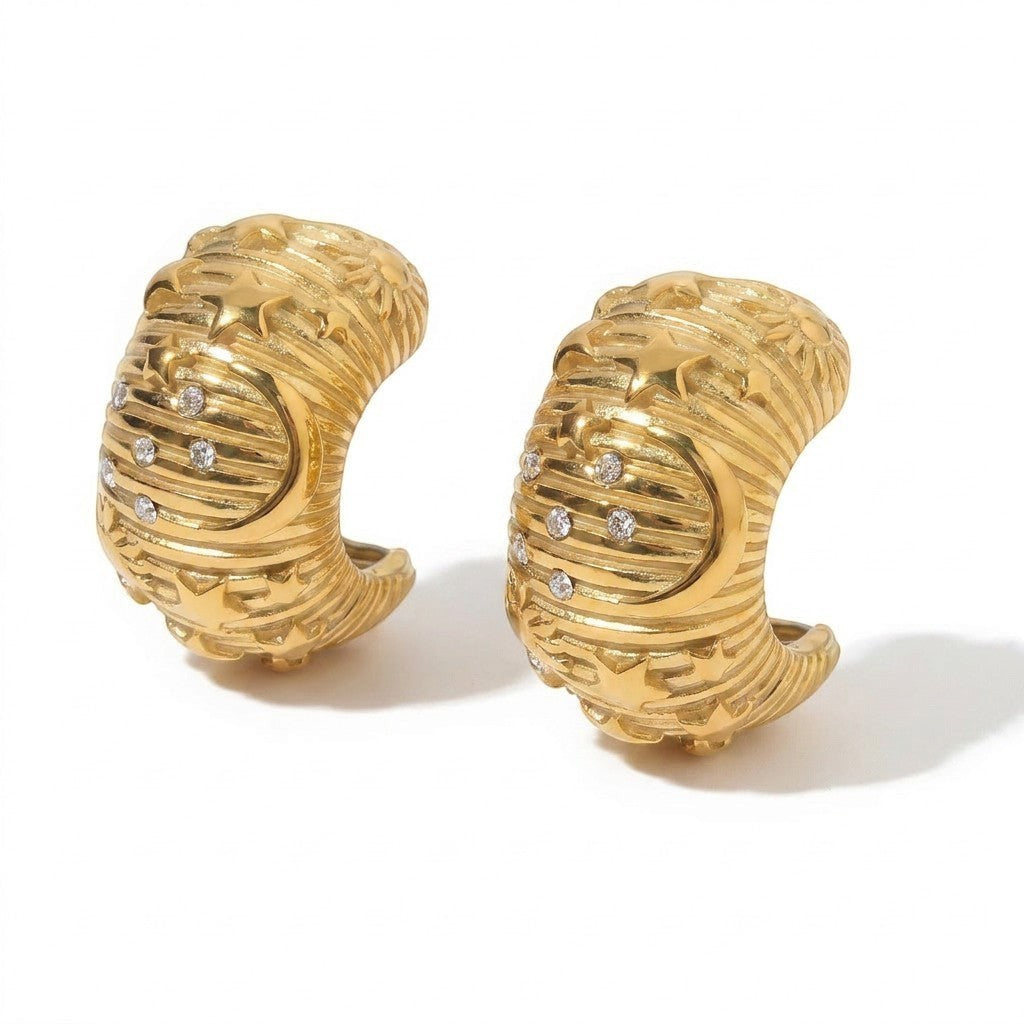 Tania Claire Australia Galaxy Hoops: gold-plated metal hoops with moon and star design, cubic zirconia accents.