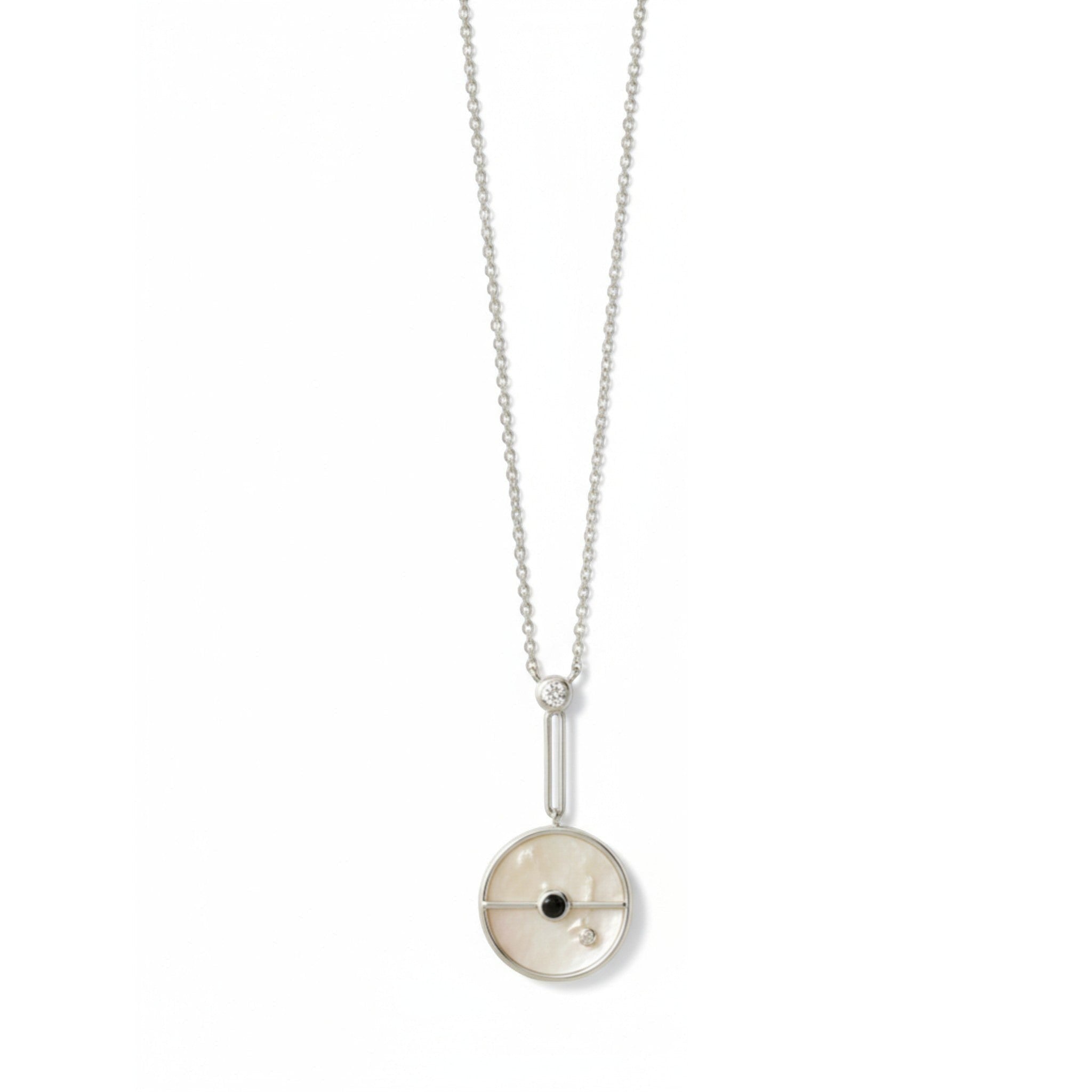 Tania Claire Australia Lunar Orbit Necklace: 14K gold, mother-of-pearl disc, sapphire cabochon, crystal accent.