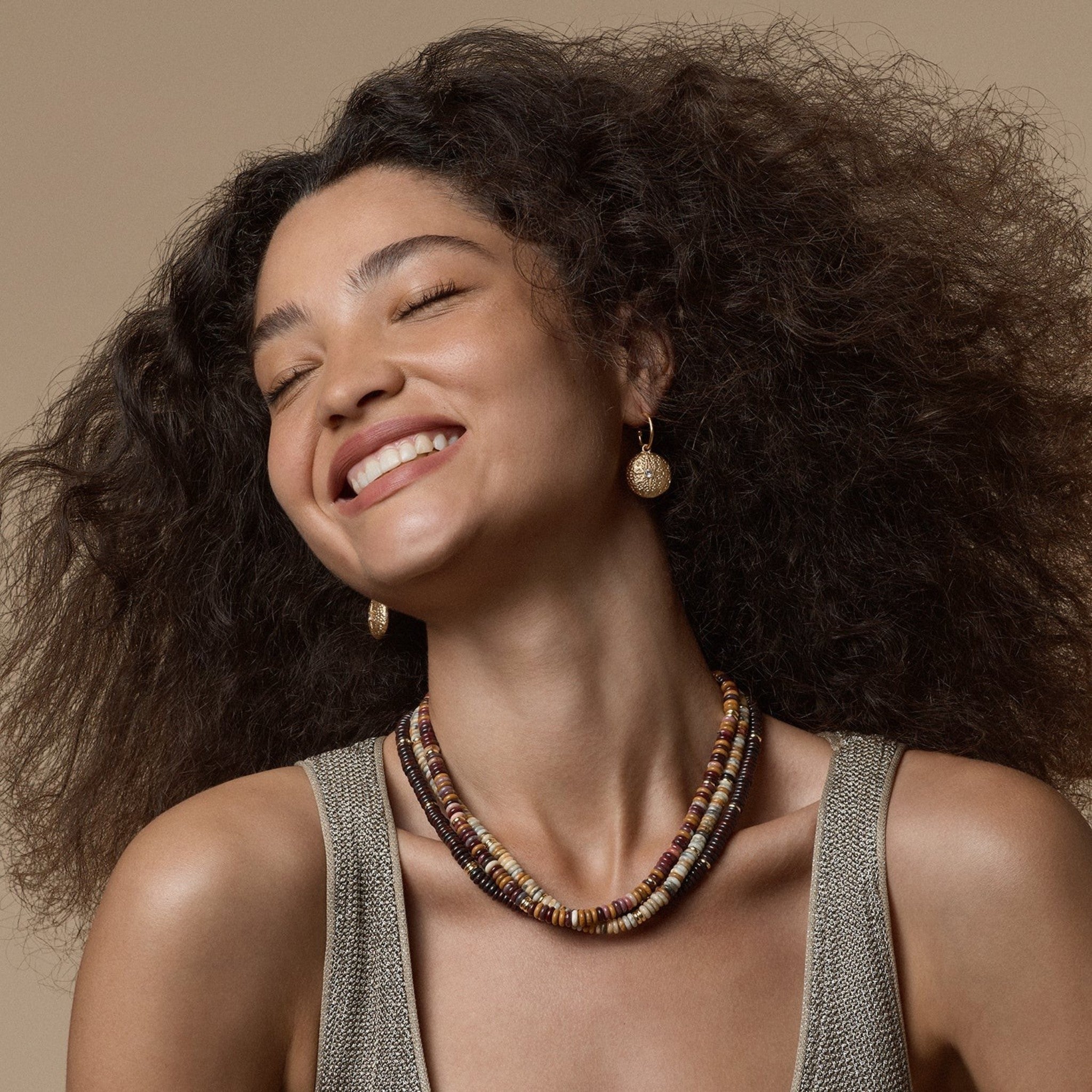 Tania Claire Australia layered multi-gemstone necklace with red, cream, and brown beads. Chic jewellery for women.