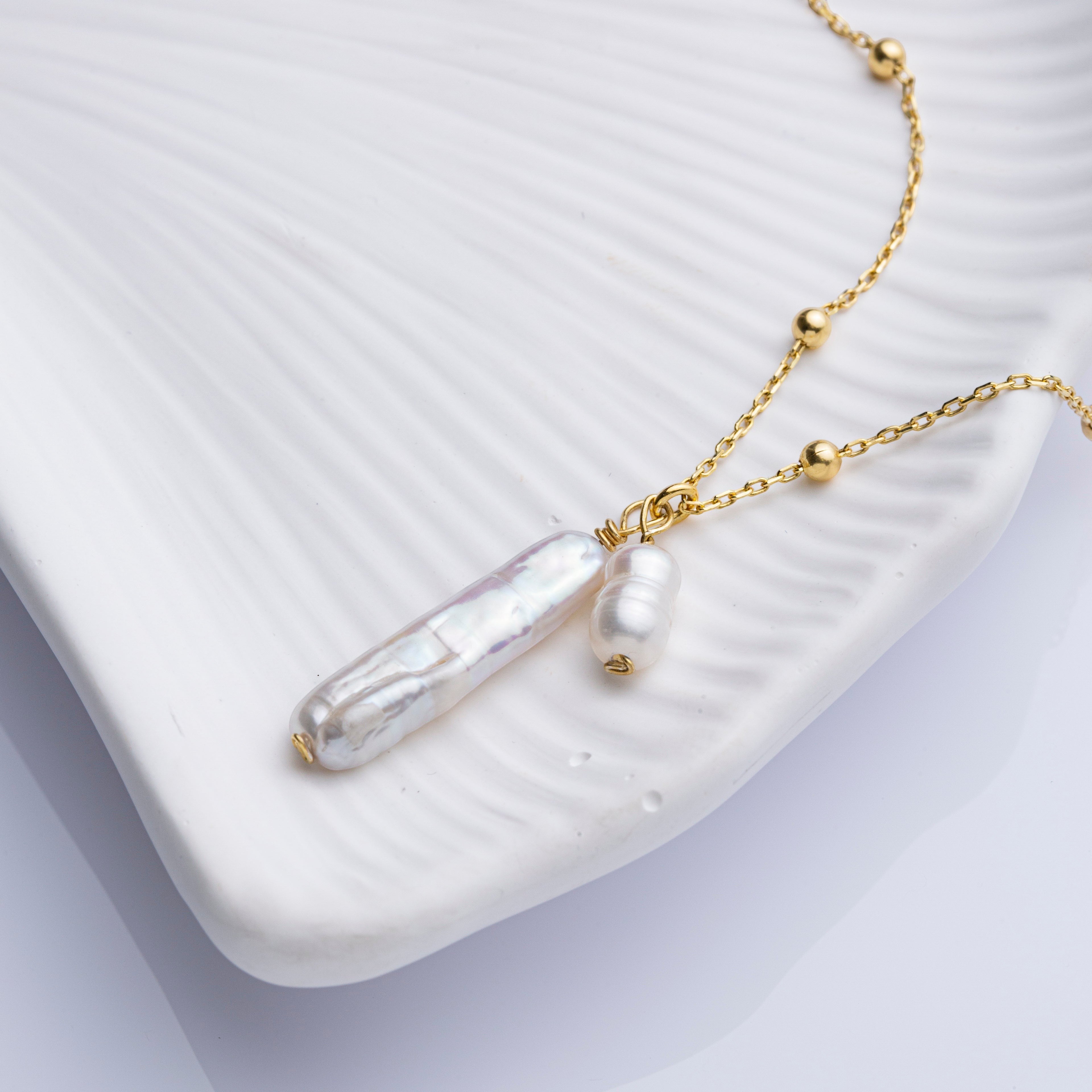 Tania Claire Australia Tidal Whispers necklace with two freshwater pearls on a beaded 18K gold vermeil chain.