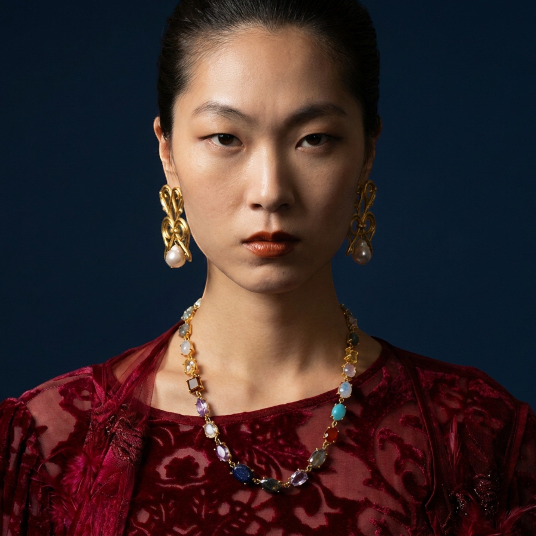 Tania Claire Australia Seraphine Pearl Wings earrings with gold sculptural wings and baroque freshwater pearls.