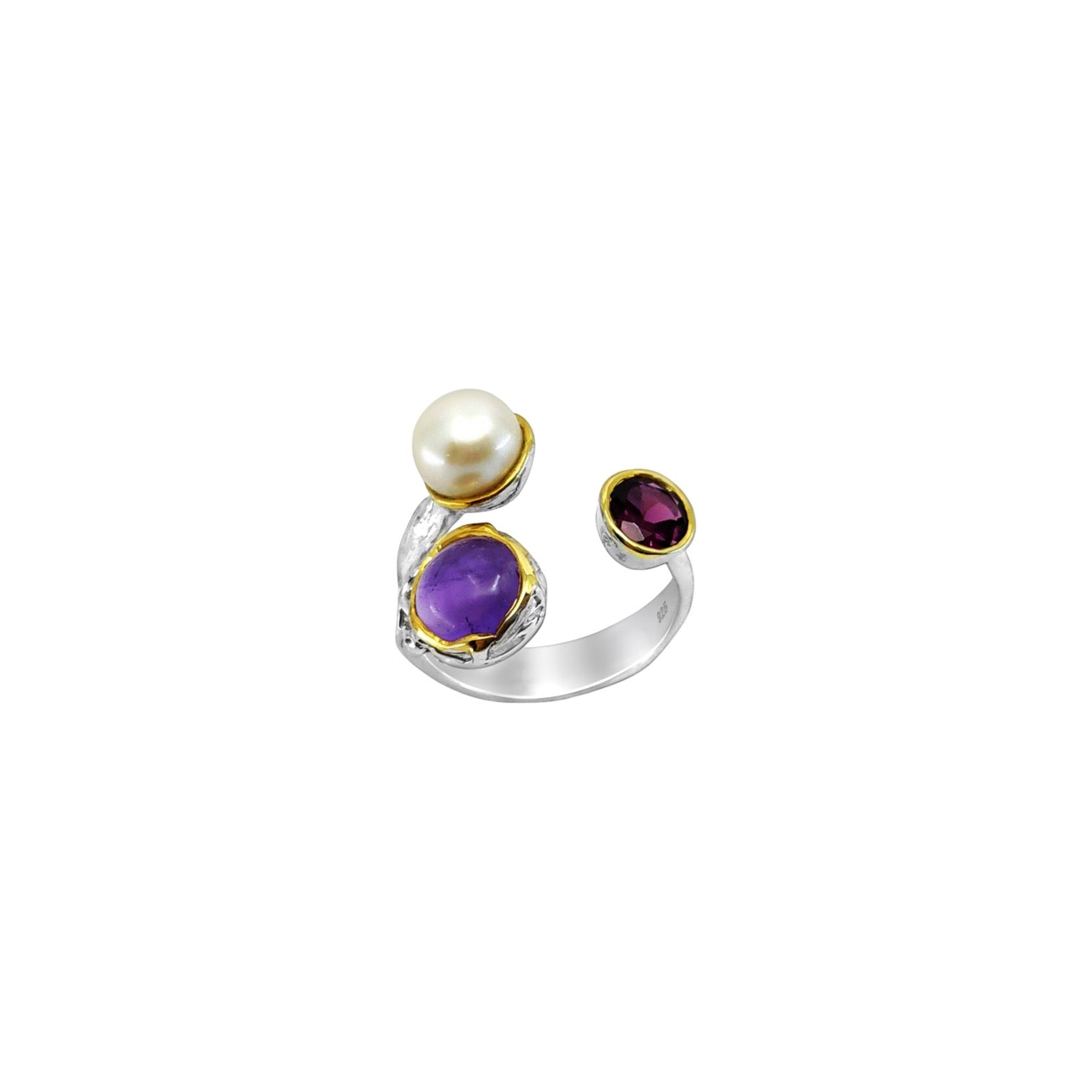 A sterling silver ring with 22K yellow gold plating, featuring a freshwater pearl, an amethyst, and a rhodolite garnet.
