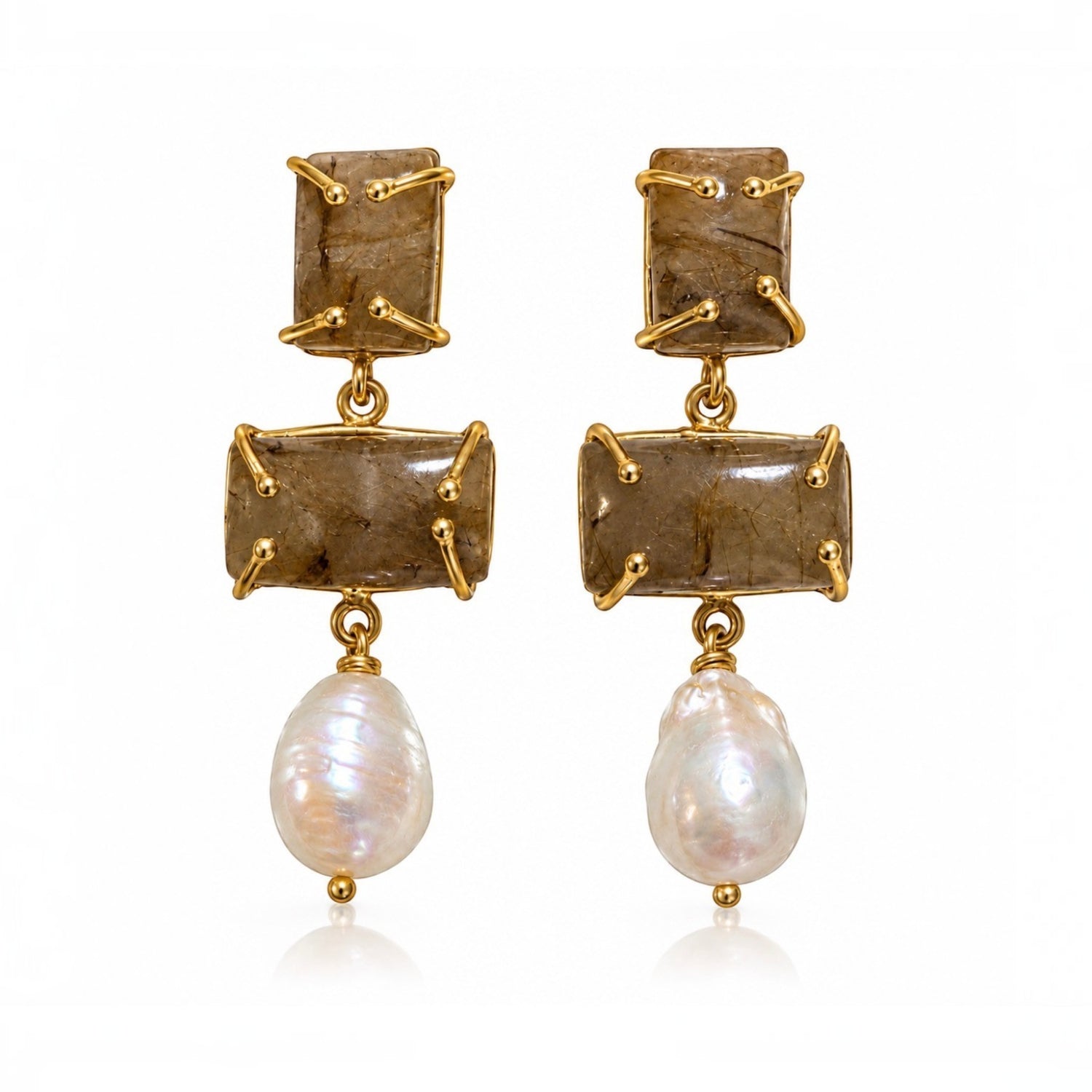 A pair of gold drop earrings featuring rectangular brown stone charms and irregular white baroque pearl drops, shown against a plain white background.