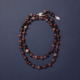 Tania Claire Australia Montmartre Twilight Necklace, hand-strung natural earthy gemstones with amethyst tones and a silver clasp.