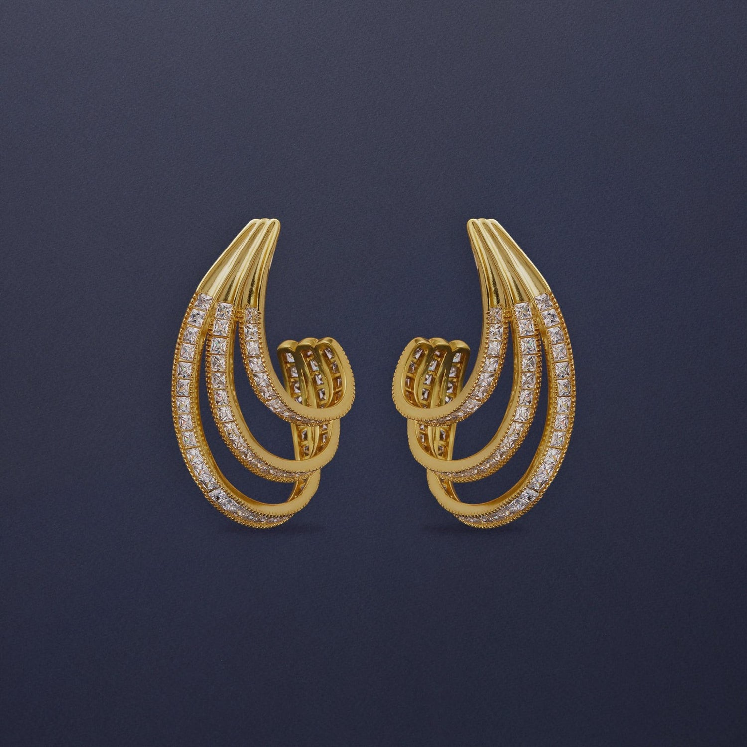 Tania Claire Australia Aurelia Arc statement earrings with gold-tone setting and crystal pavé accents.