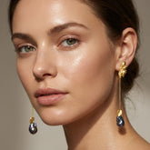 Tania Claire Australia Iridesca baroque pearl drop earrings in gold with iridescent dark blue pearls.