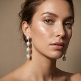 Tania Claire Australia Marnie baroque pearl drop earrings with silver-tone bezels, cascading elegantly.