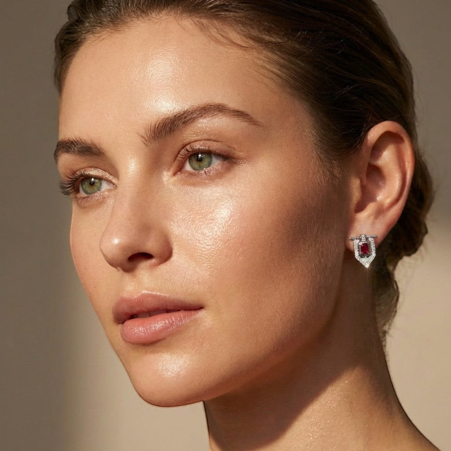 Tania Claire Australia Battleheart Studs: gold shield earrings with ruby and diamonds.