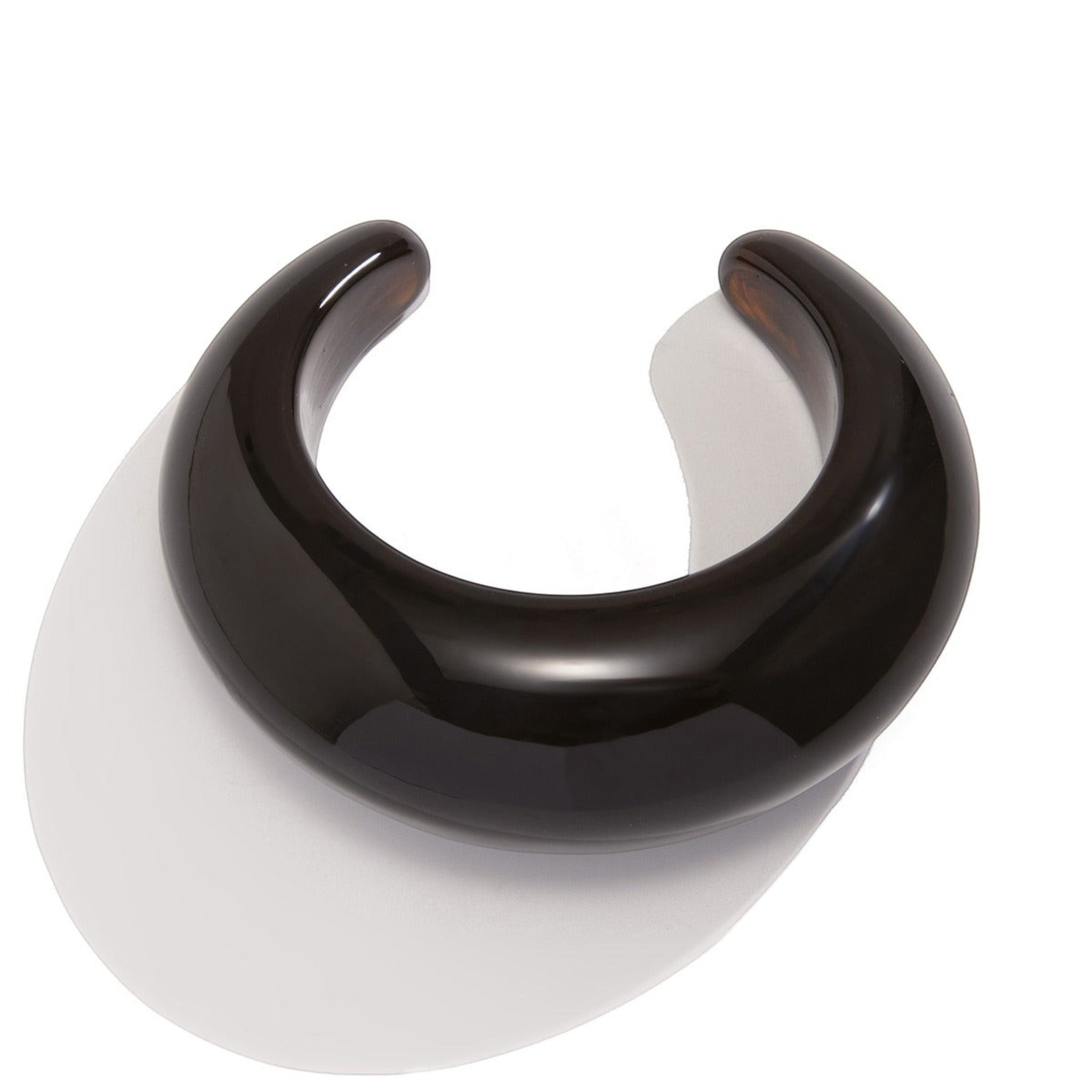 Tania Claire Australia Billy Bangle: chunky dark brown resin cuff bracelet with a polished, curved design.