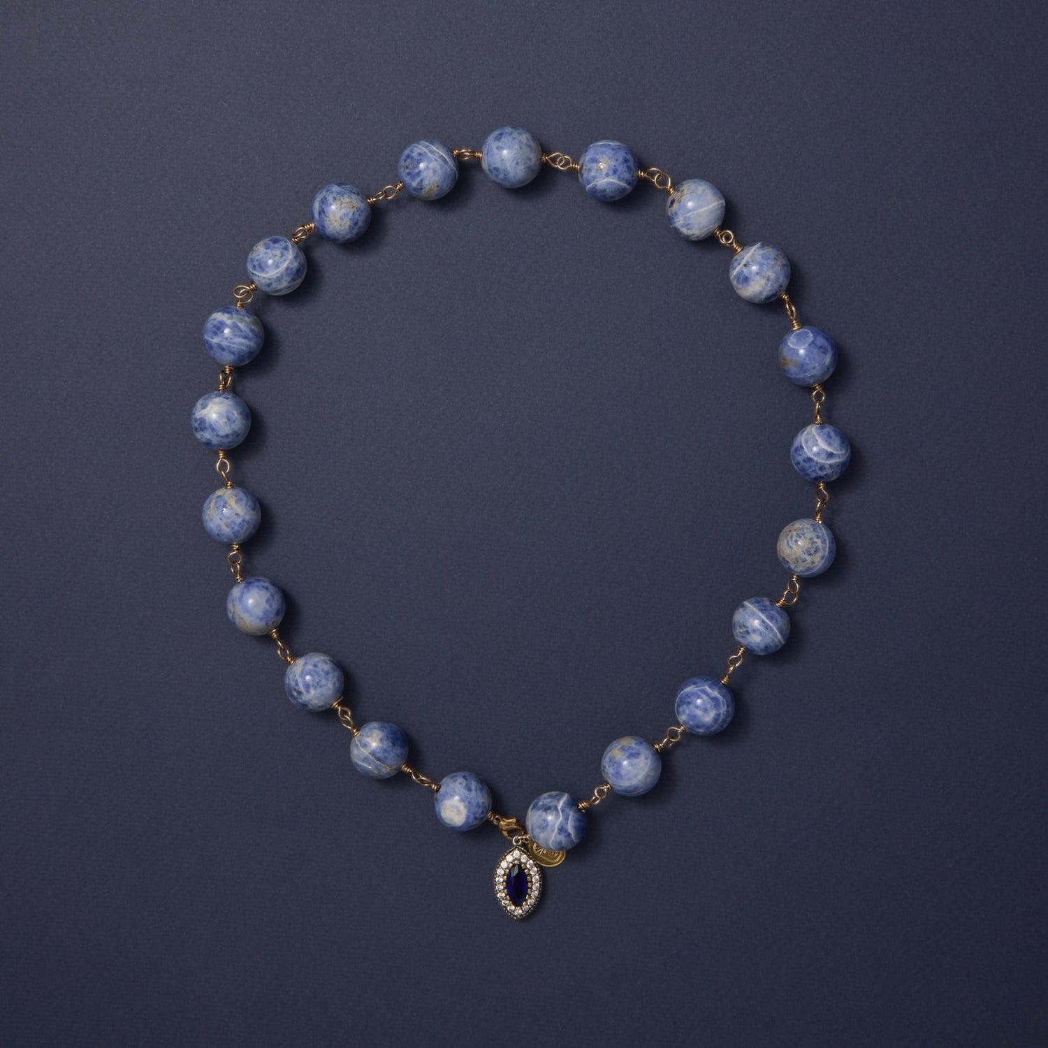 Tania Claire Australia Bleu Royale Necklace with blue sodalite beads and sapphire pendant.
