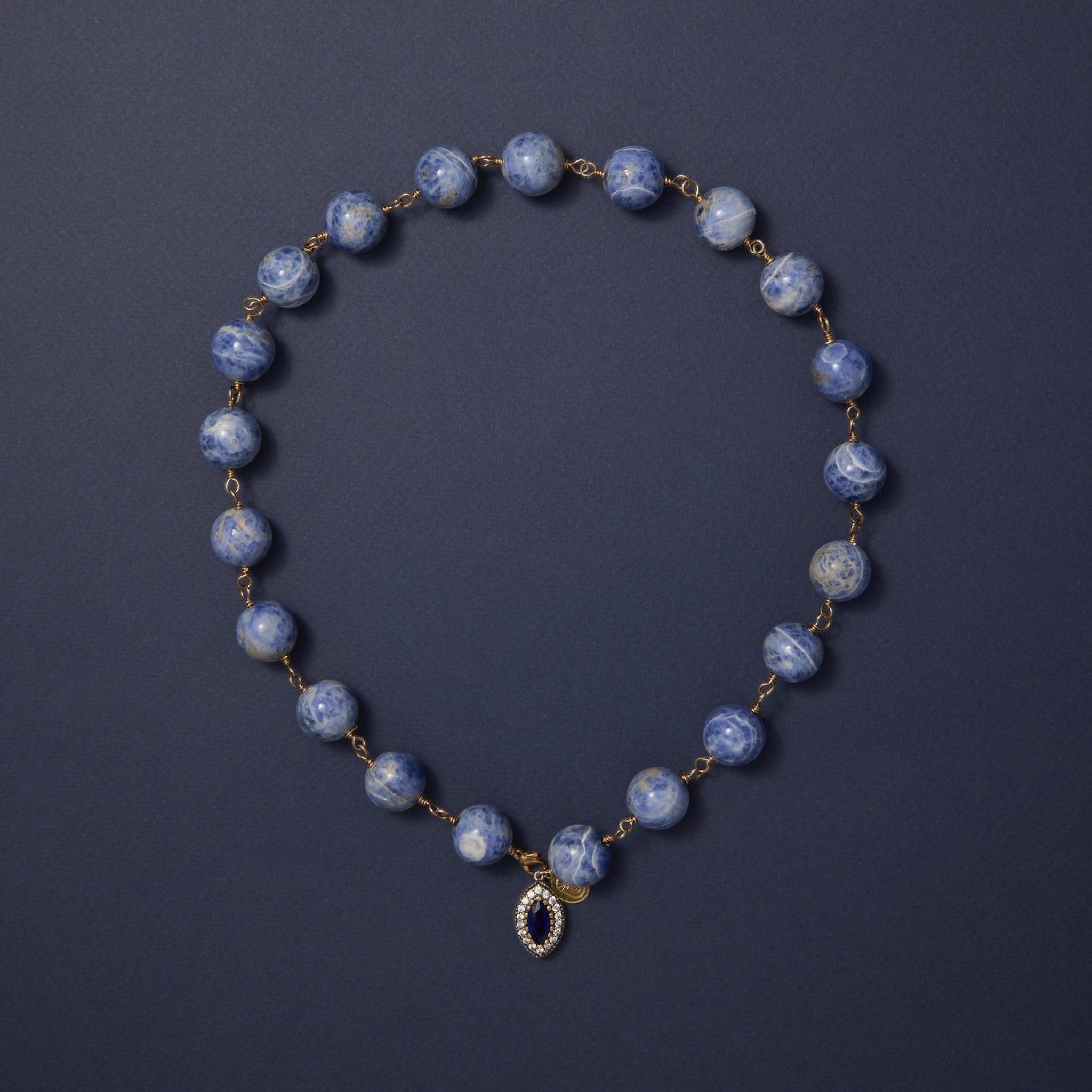 Tania Claire Australia Bleu Royale Necklace with blue sodalite beads and sapphire pendant.