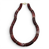 Tania Claire Australia Mia resin statement necklace in deep burgundy marbled beads with gold-tone spacers.