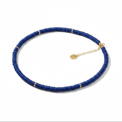 Tania Claire Australia Celestial Night Necklace: deep blue lapis lazuli beads with gold accents, adjustable gold chain.