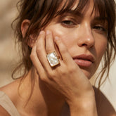 Tania Claire Australia Cleo Gemstone Ring with a rectangular mother-of-pearl stone in a gold-tone setting.