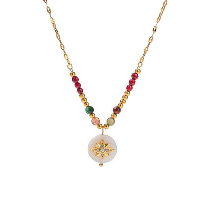 Tania Claire Australia gold-plated sterling silver necklace with colourful gemstone beads and a white disc charm featuring a starburst.
