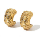 Tania Claire Australia Galaxy Hoops: gold-plated metal hoops with moon and star design, cubic zirconia accents.
