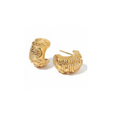 Tania Claire Australia Galaxy Hoops: gold-plated textured hoops with cubic zirconia stones and celestial design.