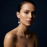 Tania Claire Australia Scarlet Tide earrings with baroque pearls and garnet stones set in gold-plated sterling silver.