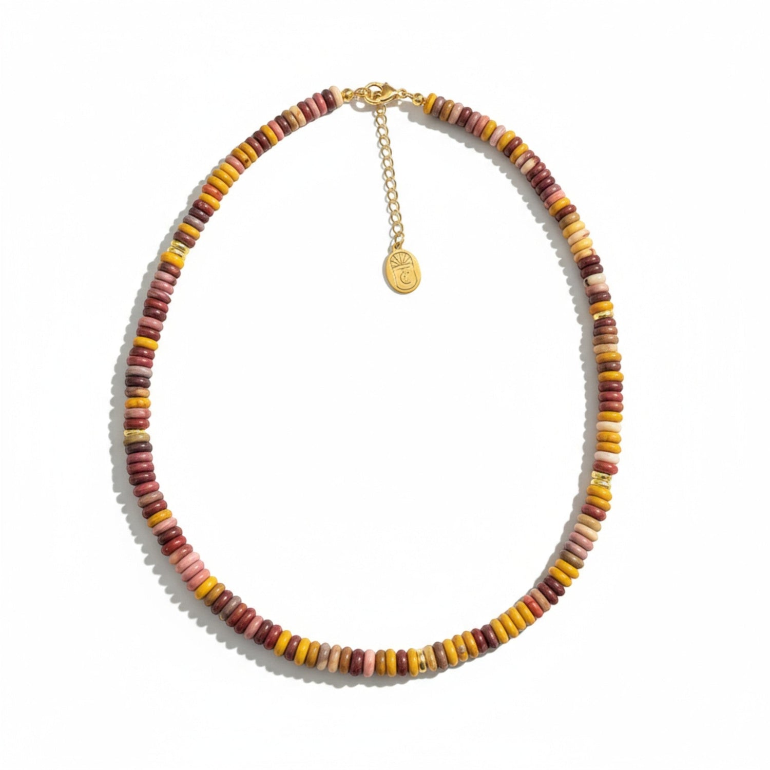 Tania Claire Australia multi-gemstone beaded necklace with gold extender chain. Features earthy tones of red, yellow, pink, and brown.