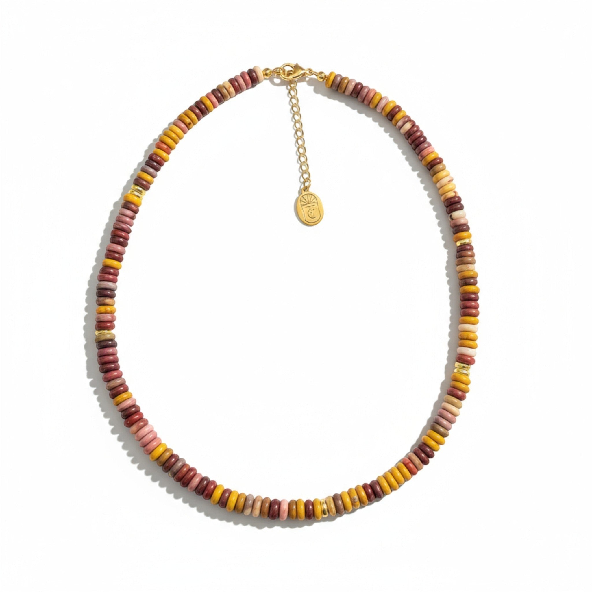 Tania Claire Australia multi-gemstone beaded necklace with gold extender chain. Features earthy tones of red, yellow, pink, and brown.