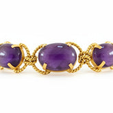 Tania Claire Australia Holly Gemstone Twist Bracelet with cabochon cut amethyst and gold plating.