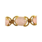 Tania Claire Australia Holly Gemstone Twist Bracelet with pink cabochon cut gemstones and gold plating.