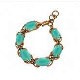 Tania Claire Australia Holly gemstone twist bracelet with gold-plated rope chain and turquoise cabochon stones.
