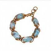 Tania Claire Australia Holly gemstone twist bracelet with blue cabochon stones and gold-plated rope chain links