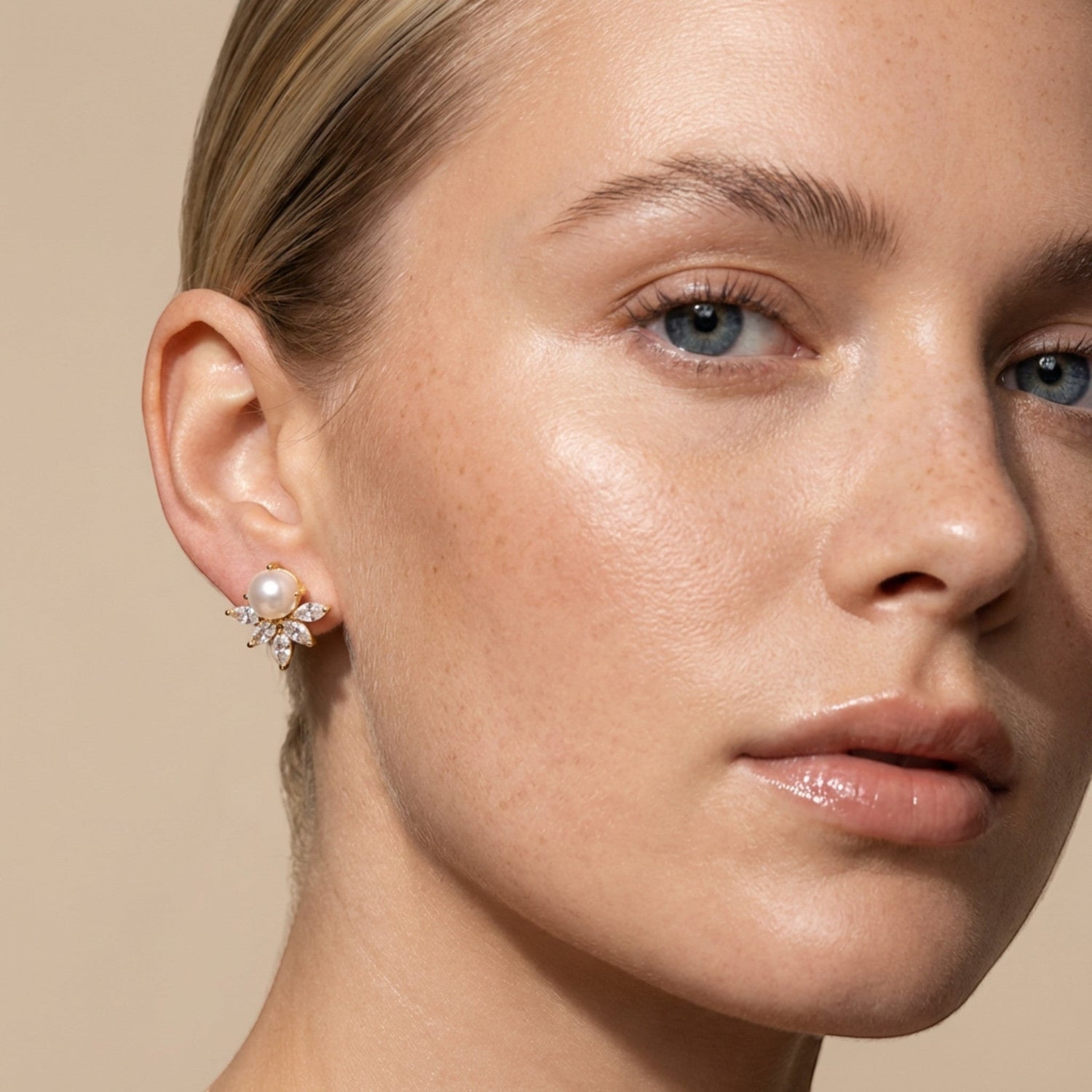 Tania Claire Australia Goddess Drop Earrings with pearl and cubic zirconia in gold-tone finish.
