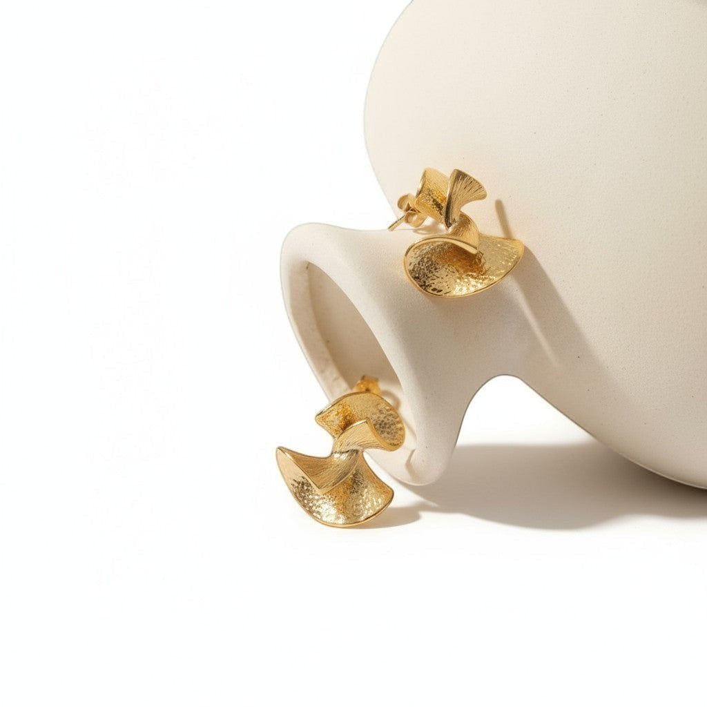 Tania Claire Australia gold abstract bell drop earrings with textured finish.