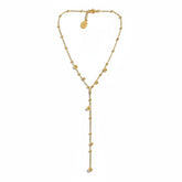 Tania Claire Australia gold bubble necklace with a Y-drop chain and small bead accents.