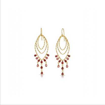 Tania Claire Australia Desert Dancer gold finish sterling silver earrings with garnet drops.