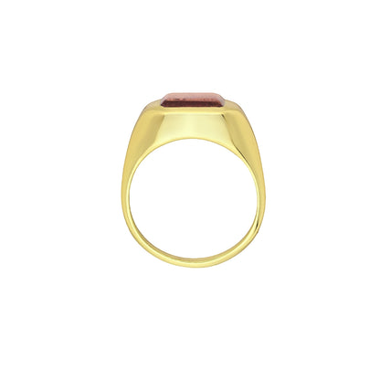 Tania Claire Australia gold signet ring with a rectangular faceted garnet gemstone. Modern sculptural design.