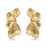 Tania Claire Australia Dryas Crest earrings featuring sculptural gold leaf designs with ribbed textures.