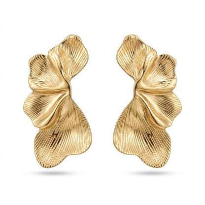 Tania Claire Australia Dryas Crest earrings featuring sculptural gold leaf designs with ribbed textures.