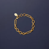 Tania Claire Australia gold plated brass Rive Gauche link bracelet with sculptural textured links and adjustable closure.