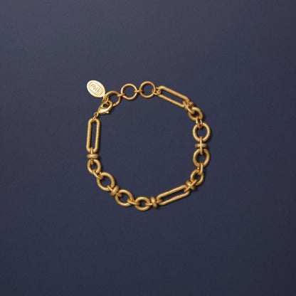 Tania Claire Australia gold plated brass Rive Gauche link bracelet with sculptural textured links and adjustable closure.