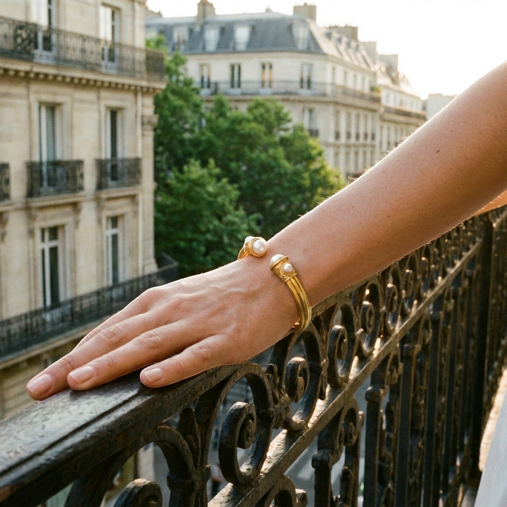 Tania Claire Australia gold cuff bracelet with pearl accents, open design, Parisian style.