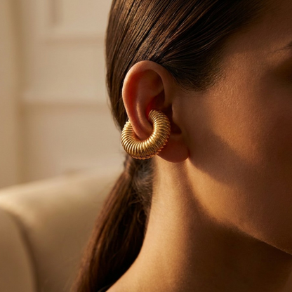 Tania Claire Australia gold-tone ear cuff with a chunky, ribbed architectural design worn on a model&