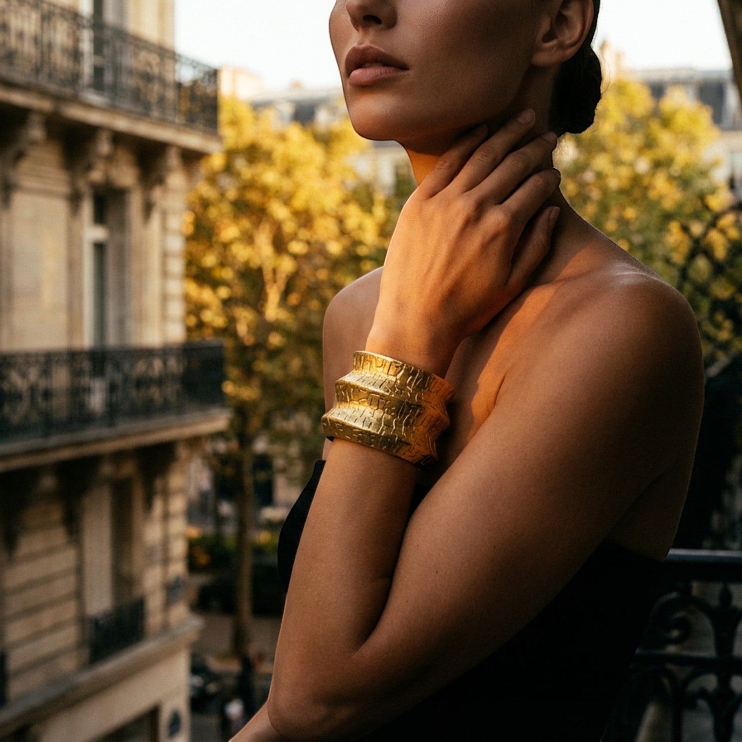Tania Claire Australia gold-tone Terra Script Cuff with textured, layered sculptural bands and an adjustable open design.