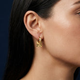 Tania Claire Australia gold sunburst charm hoop earrings with pavé detail on huggie.