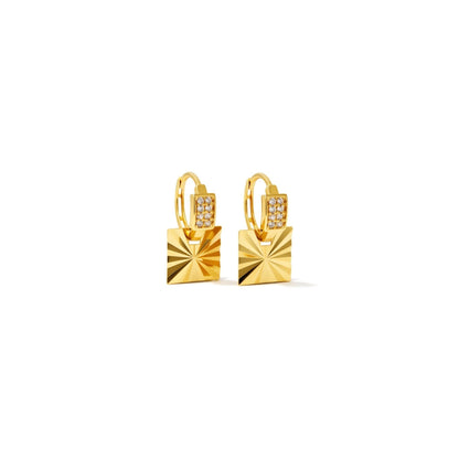 Tania Claire Australia gold sunburst charm hoop earrings with pavé details.
