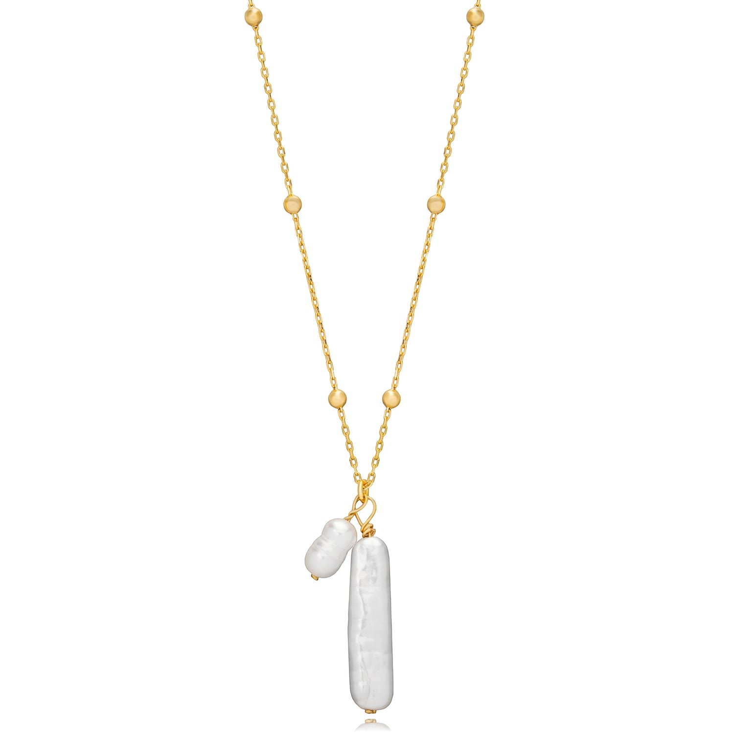 Tania Claire Australia gold vermeil necklace with two freshwater pearls, one elongated and one rounded, on a beaded chain.