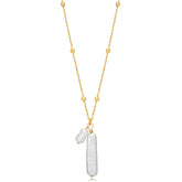 Tania Claire Australia gold vermeil necklace with two freshwater pearls, one elongated and one rounded, on a beaded chain.