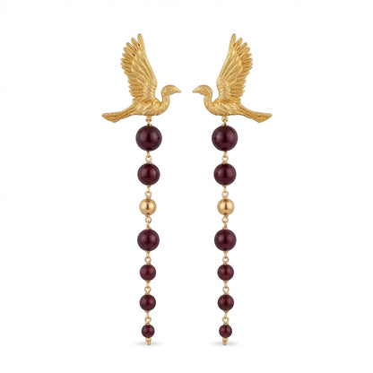 Tania Claire Australia gold pilgrim wing earrings with cascading deep red beads and gold accents.