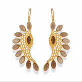 Tania Claire Australia gold-plated wing earrings with smoky quartz stones and intricate lattice work.