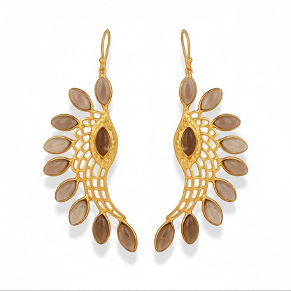 Tania Claire Australia gold-plated wing earrings with smoky quartz stones and intricate lattice work.
