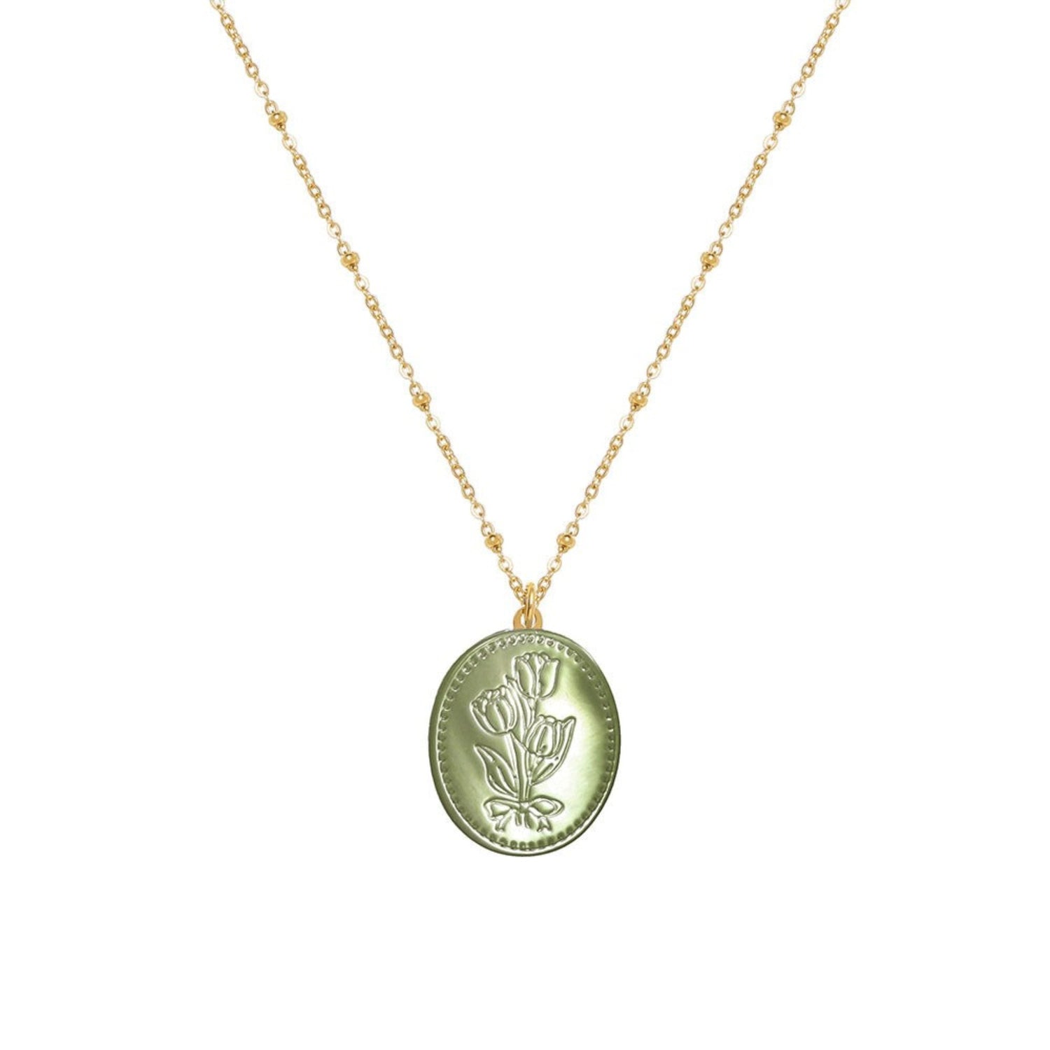 Tania Claire Australia green oval pendant necklace with embossed floral motif and beaded gold-plated chain.