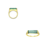 Tania Claire Australia Sylvia ring with a rectangular green tourmaline stone set in a yellow gold frame, made of sterling silver.